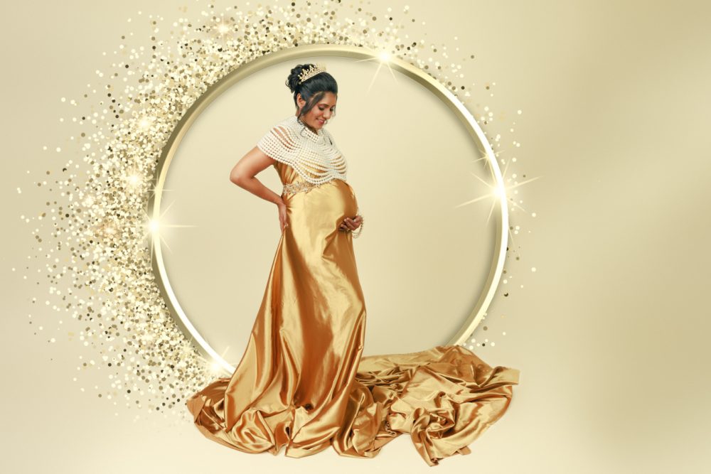 maternity photo in golden gown