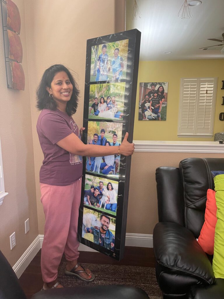 women holding family photoframe
