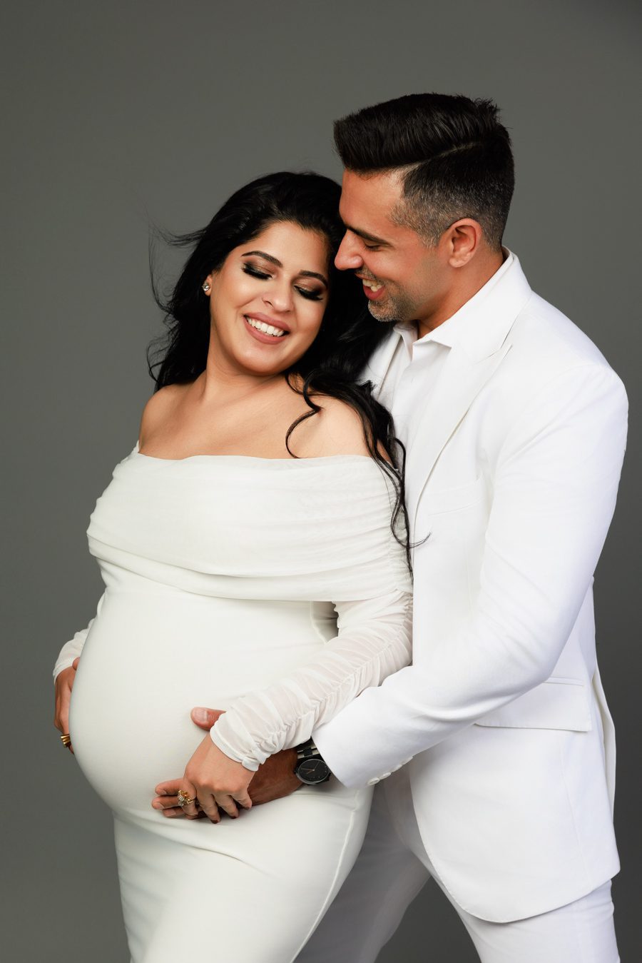 Maternity photography client closet — gowns and silks at Pooja Photography San Ramon