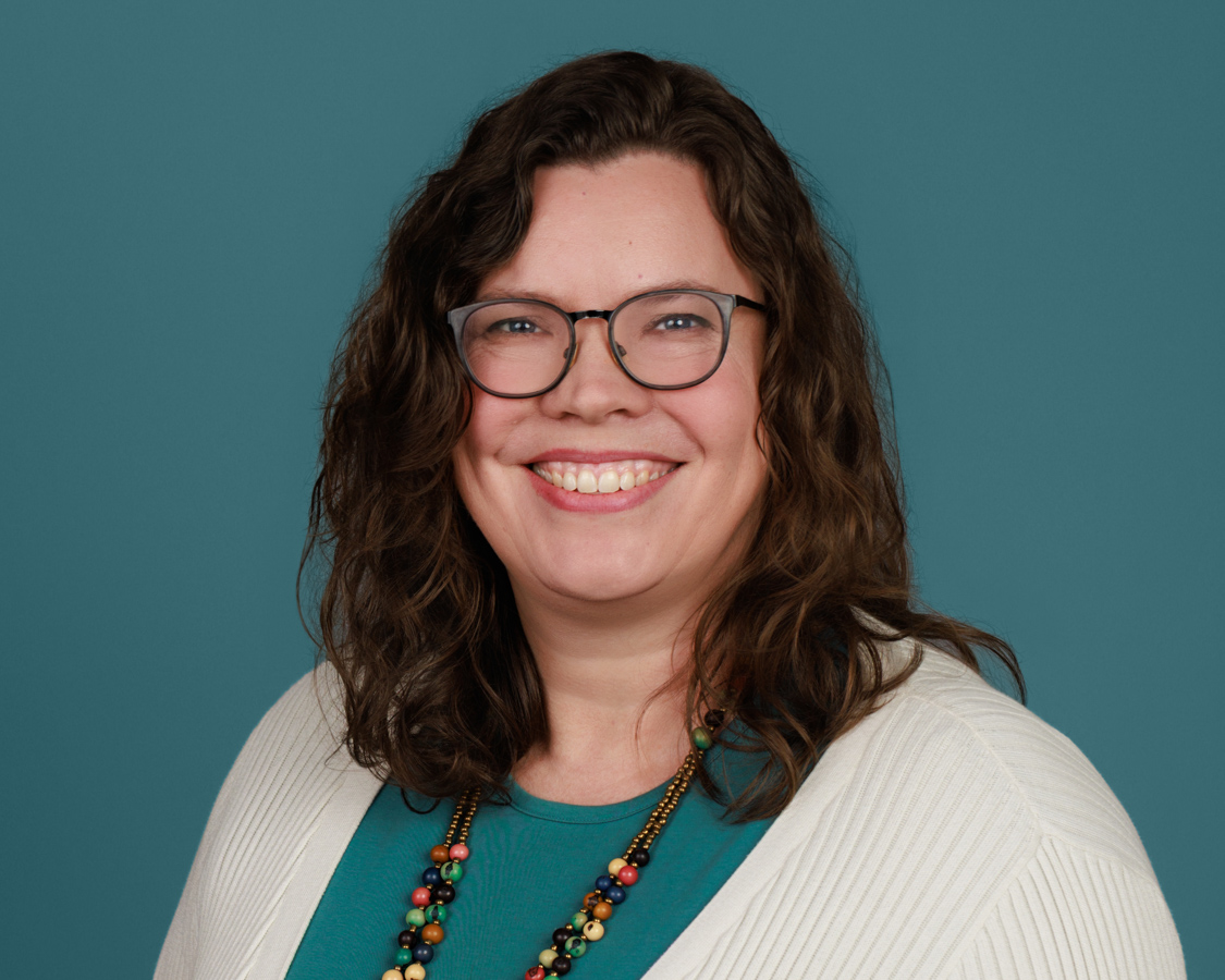 HR manager reviewing professional team headshots from a corporate headshot day in Bay Area